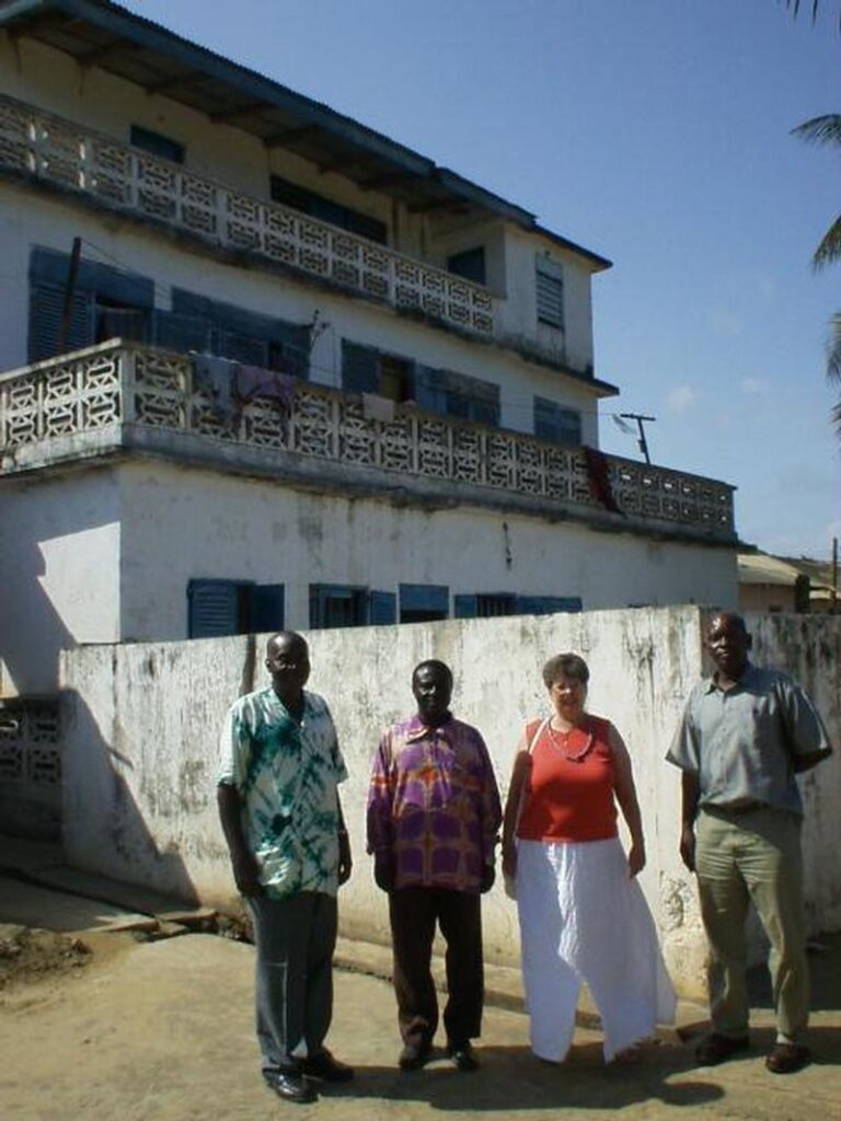 In front of Emmanuel Kwesi Essel's home